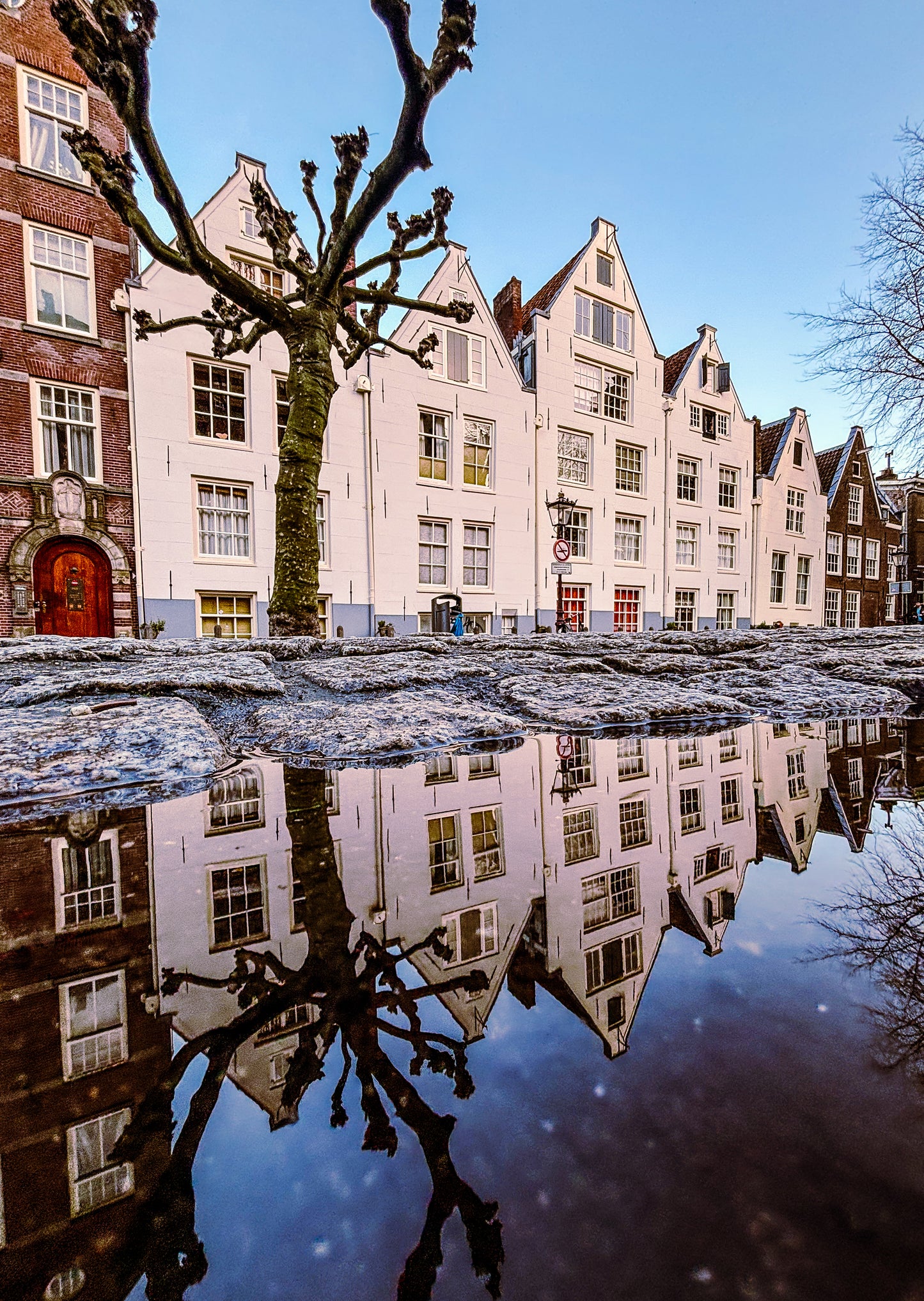 Amsterdam puddle reflection
