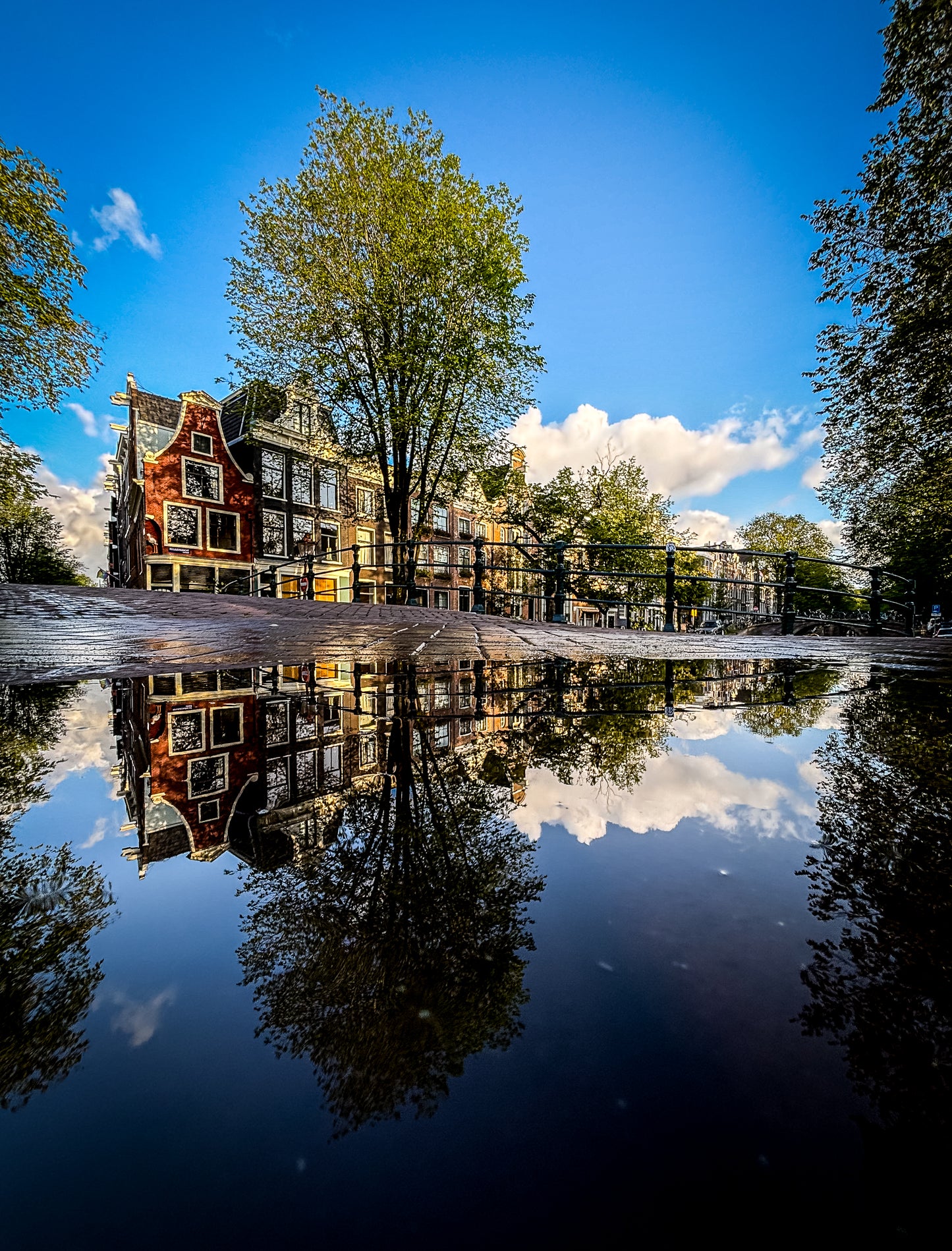 Amsterdam puddle reflecion