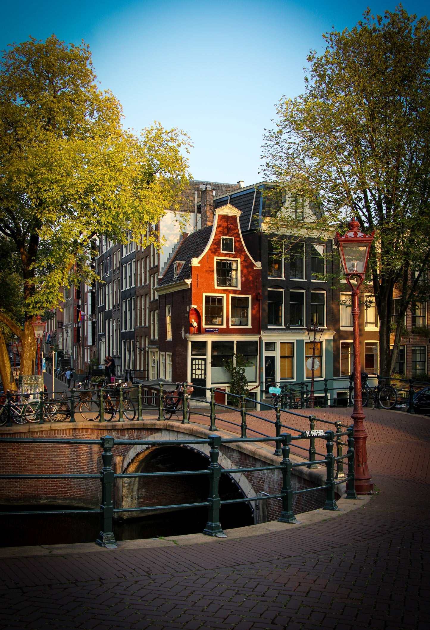 Amsterdam canal morning sunlight